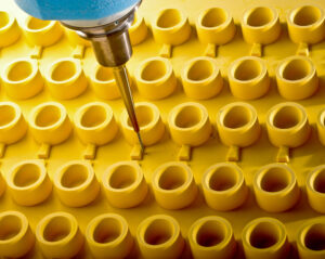 PU tooling material in a CNC machine showing machining details